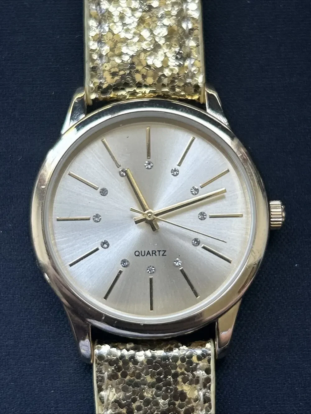 Gold Tone Case And Glitter Band Women’s Quartz Watch